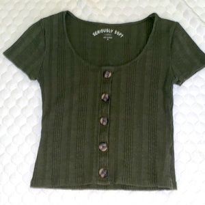 olive green shirt with decoration purposes buttons